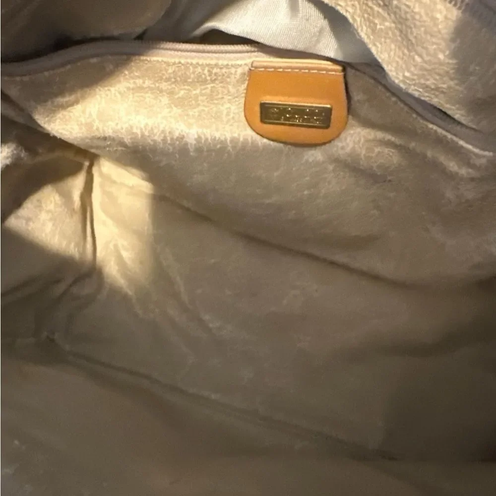 Gucci Beige Interior with Gold Accent
